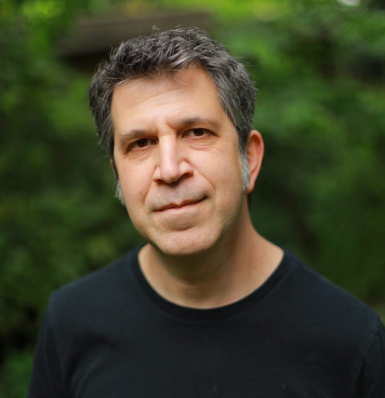 author scott nadelson standing by a forest